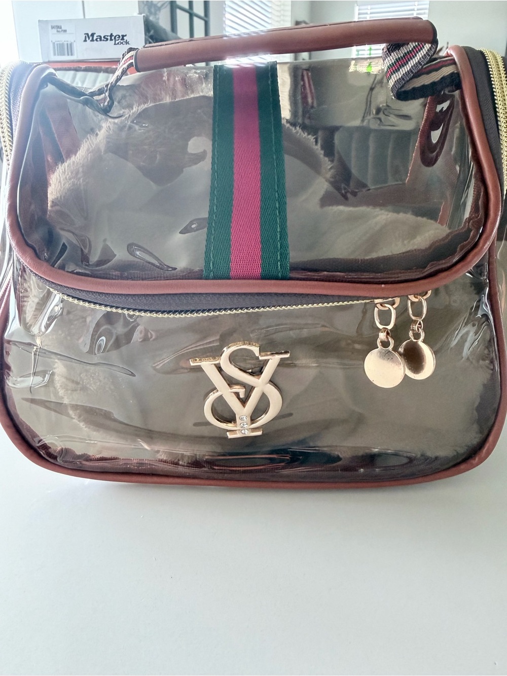 Sophia Joy Clear PVC Cosmetic Bag with Brown Trim and Green-Pink Stripe
